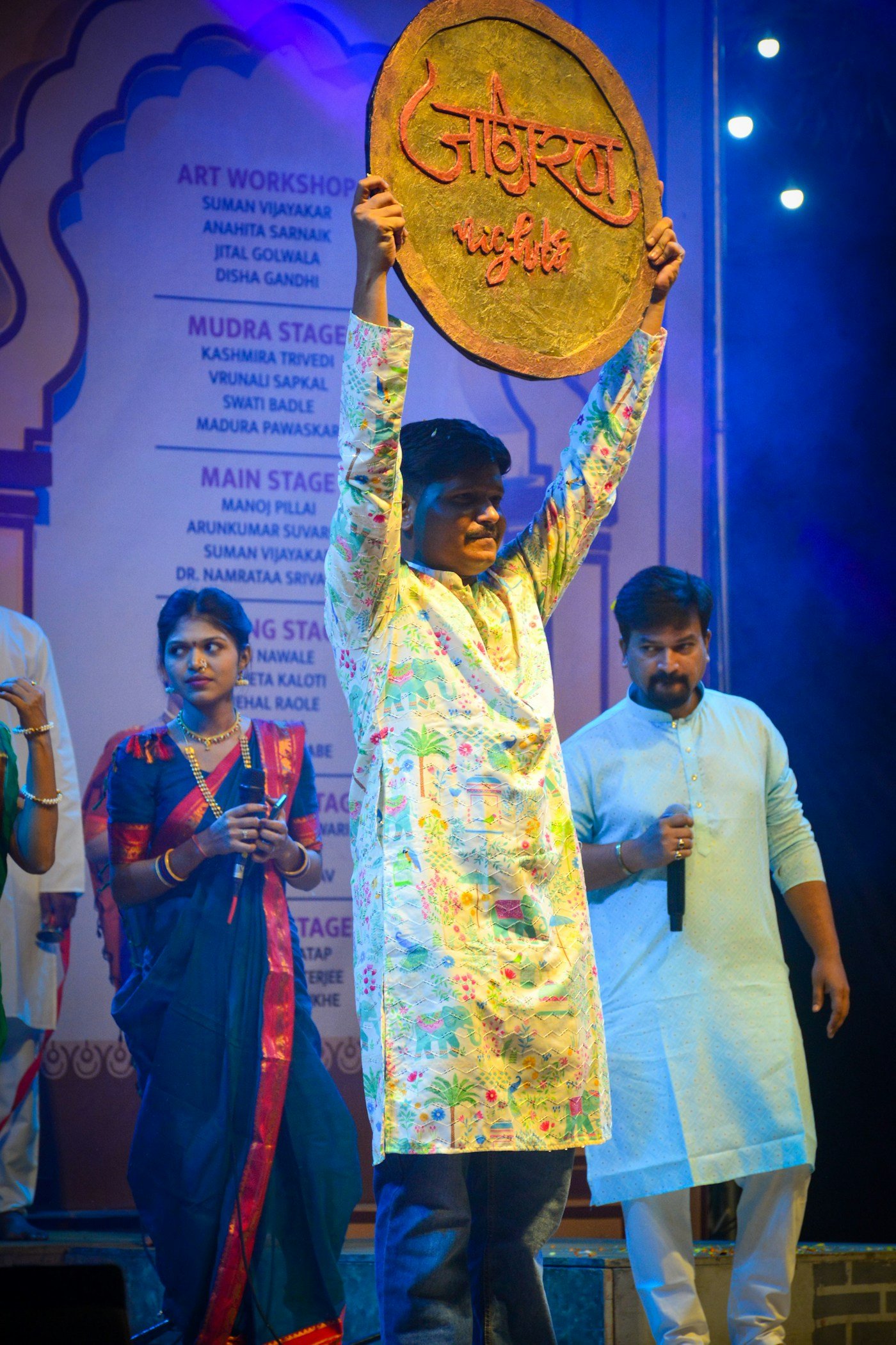 Awardee moment on stage during a live event